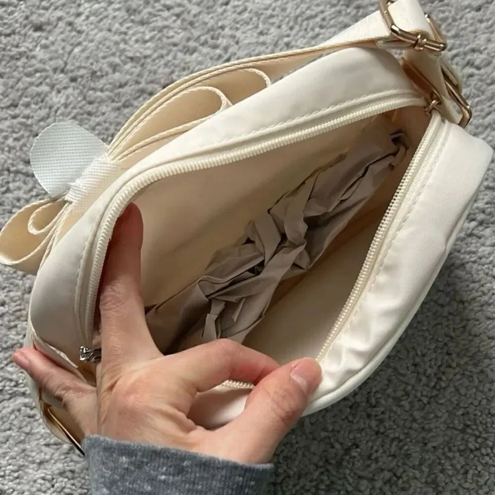 NWT Gorgeous Biossance White/ Ivory Satin Light Cushion adjustable crossbody bag